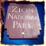 A sign that says zion national park.