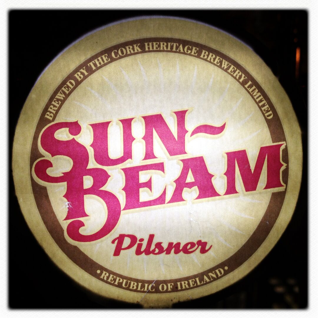 A sign that says sun beam pilsner.