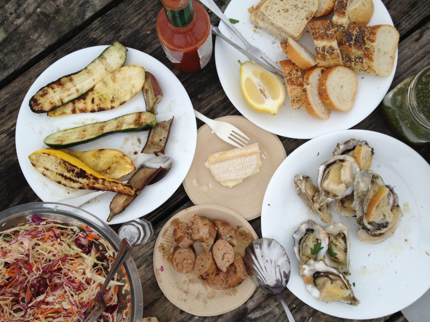 A table with a lot of food on it.