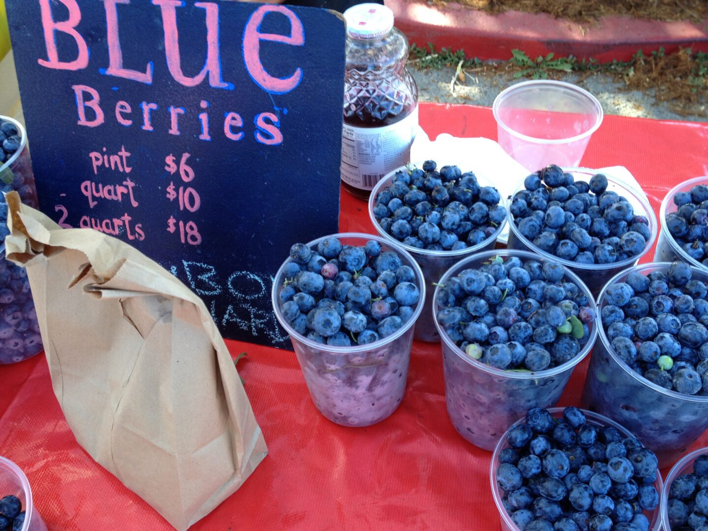 Blue berries on a table.