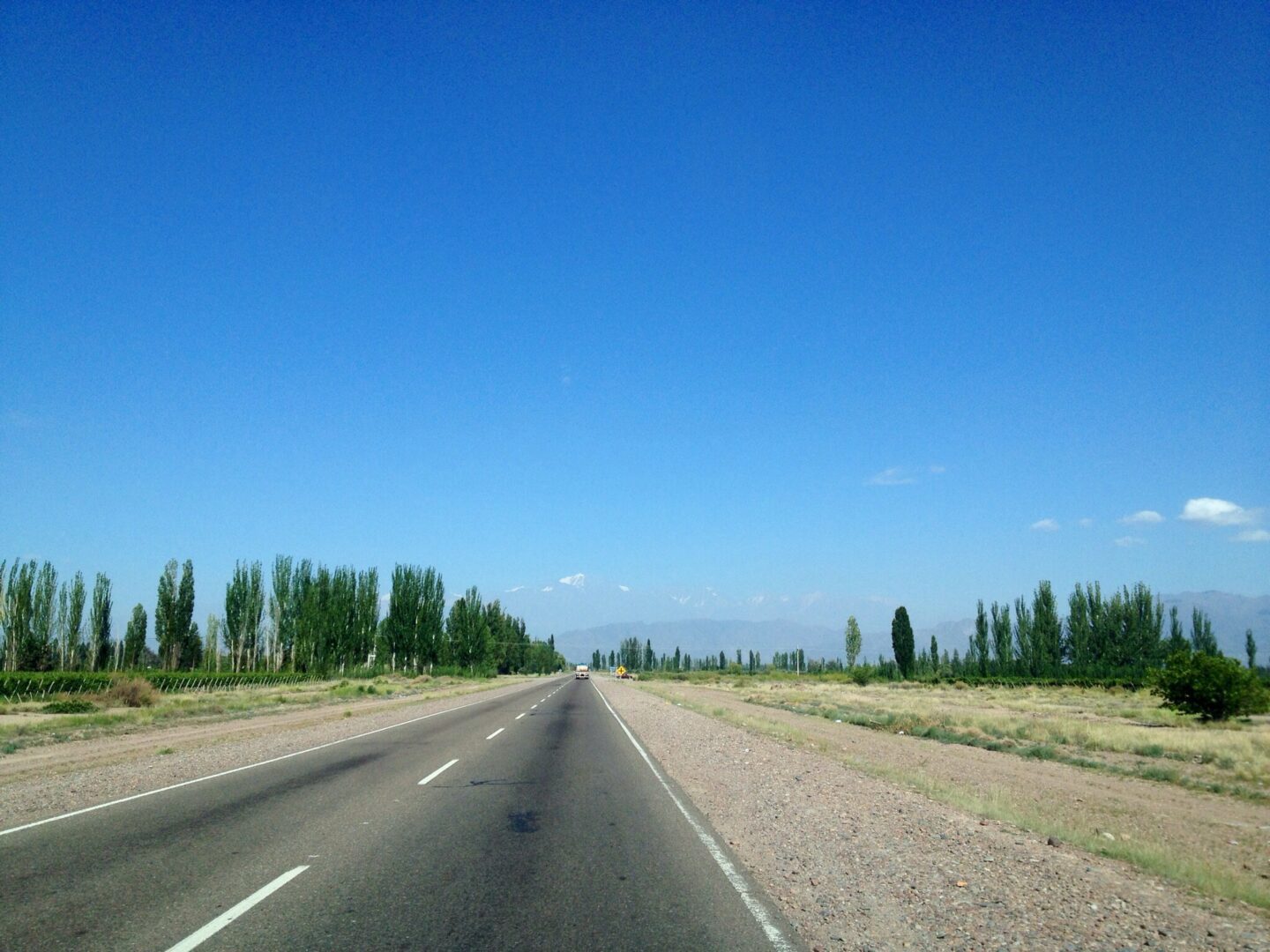 A road in the middle of a desert.