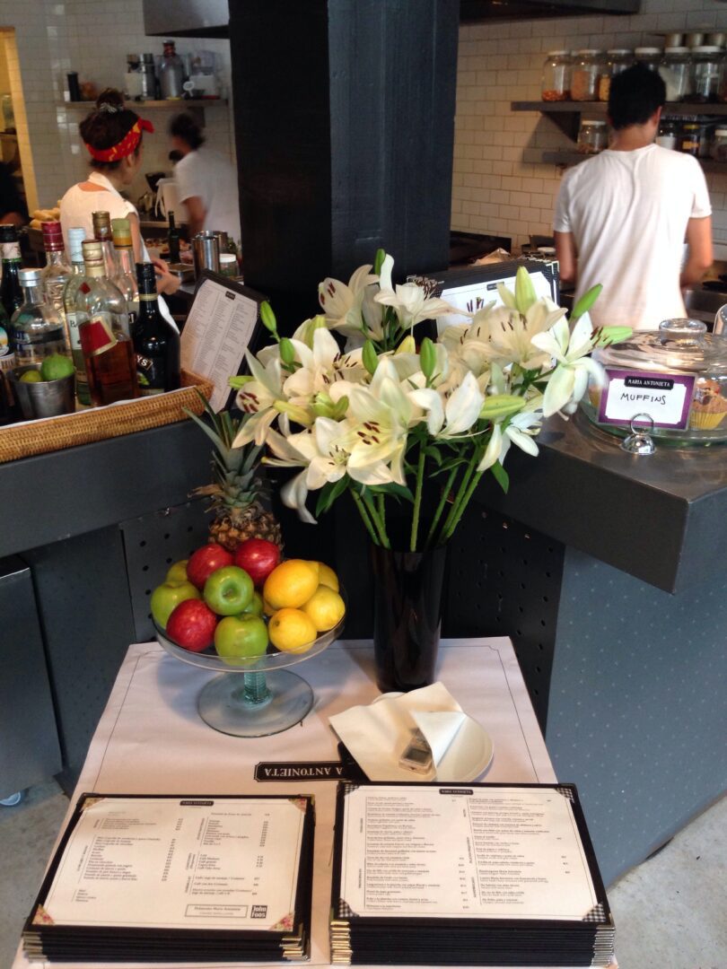 Flowers in a bowl on a table.
