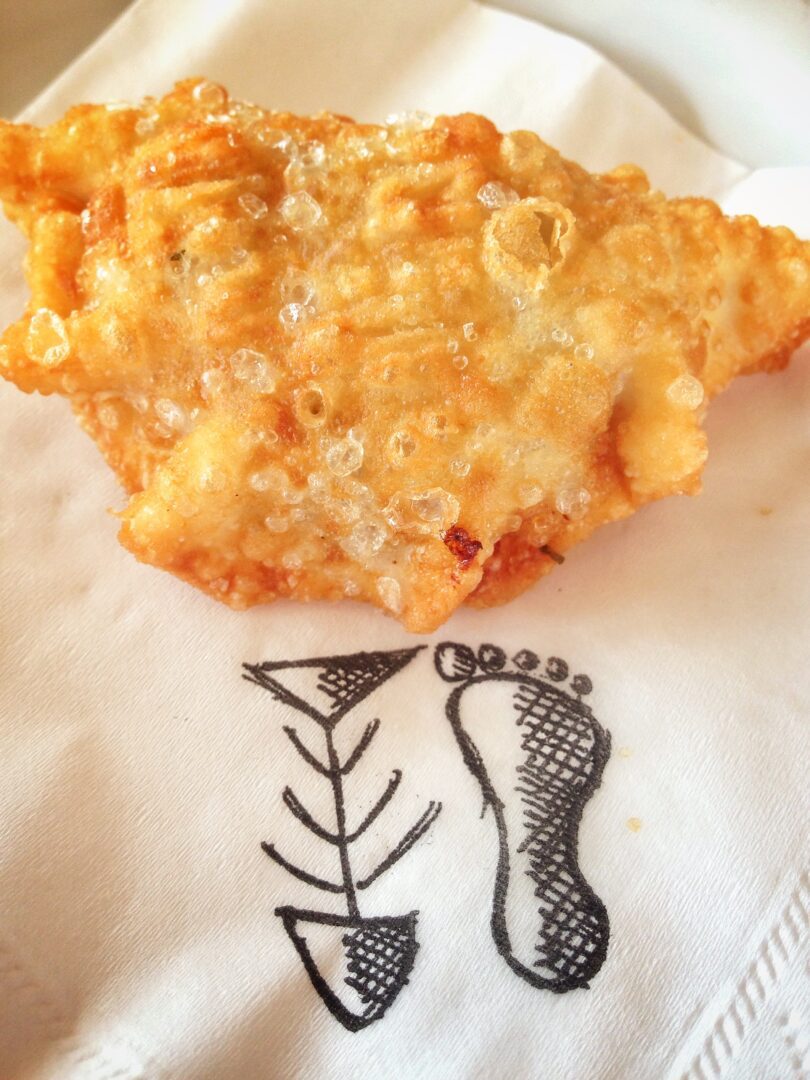 A piece of food on a napkin.