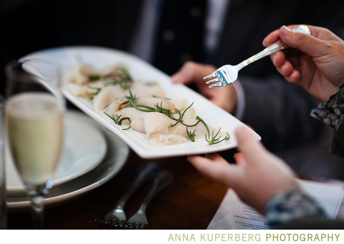 A person is holding a plate of food.