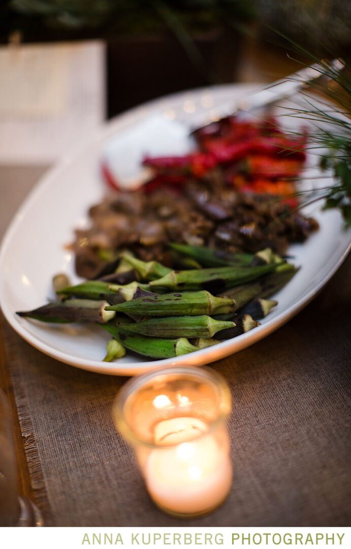 A plate of food with a candle on it.