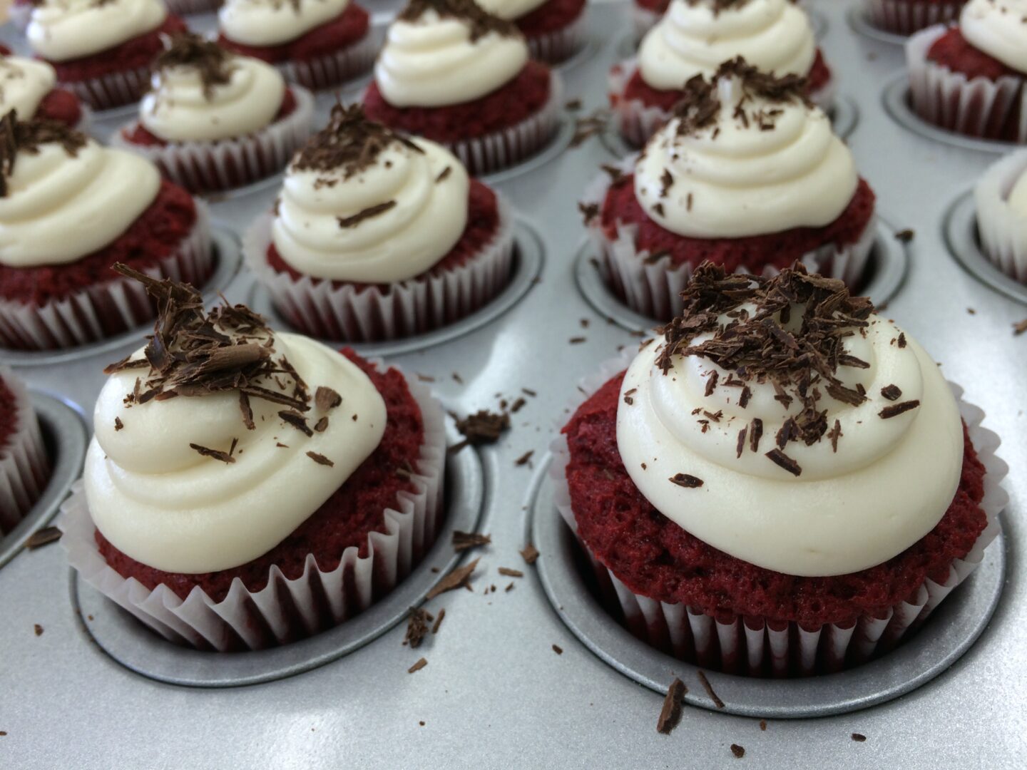 Red velvet cupcakes with chocolate icing.