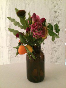A vase filled with flowers on a table.