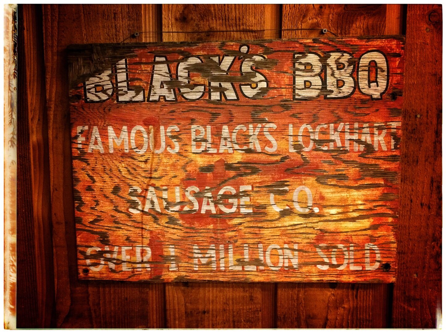 A sign that says black's bbq.