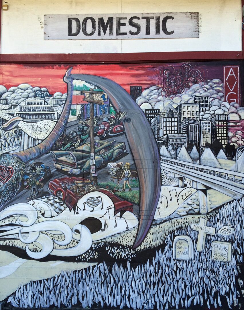 A mural of a train station with the words domestic on it.