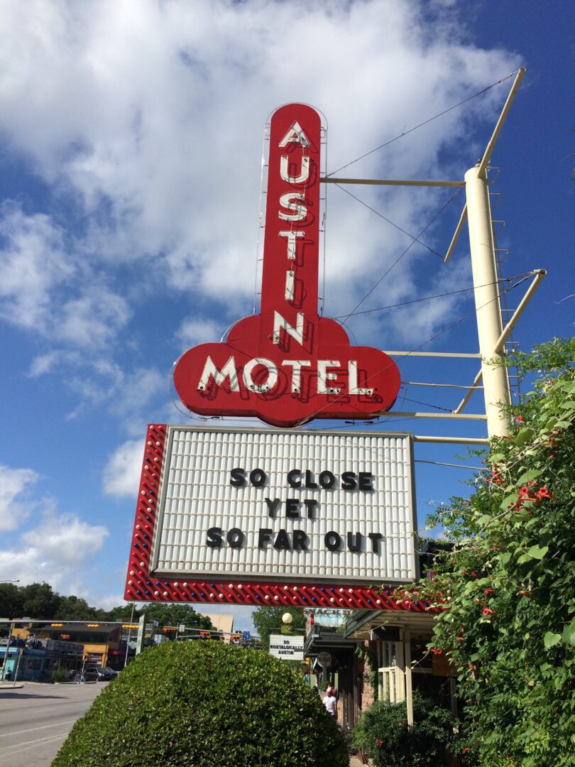 A sign that says austin motel.