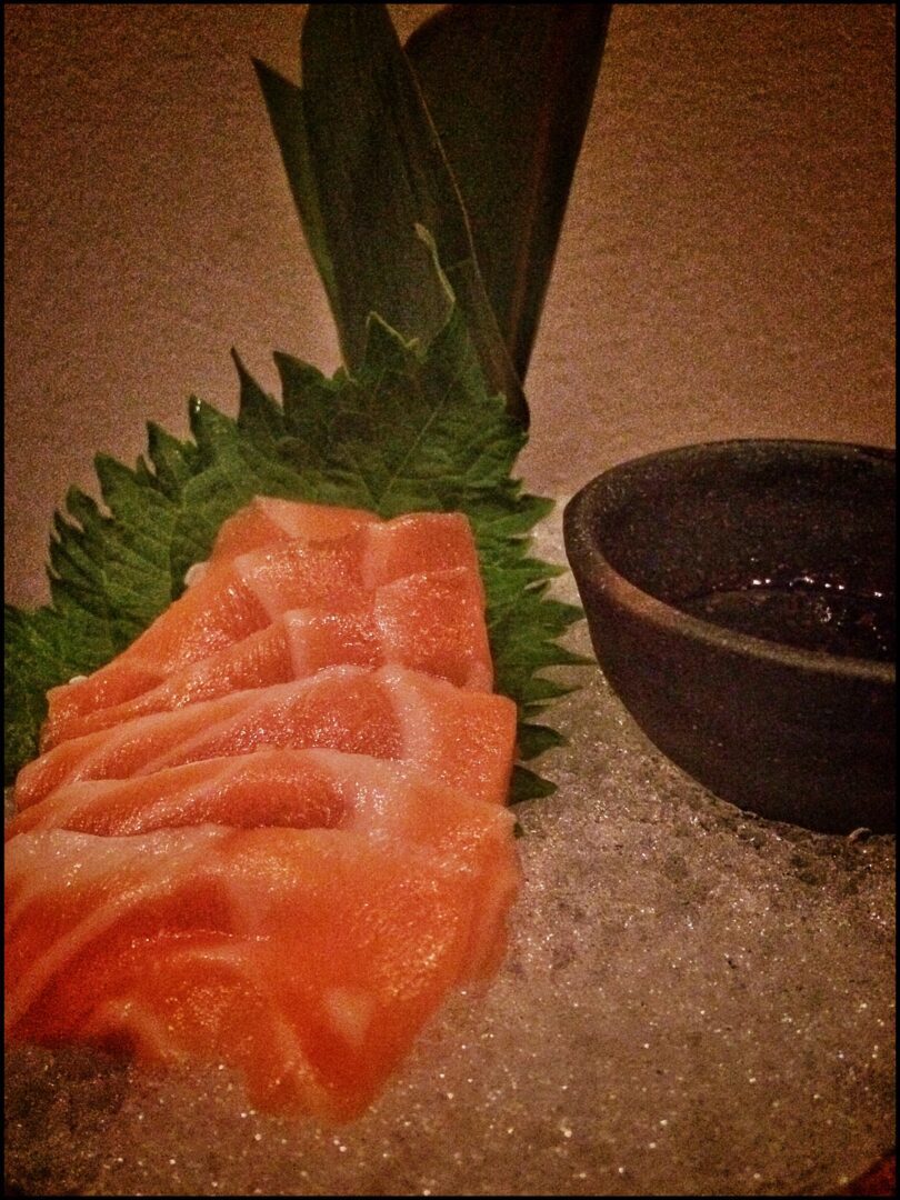 A bowl of sashimi.