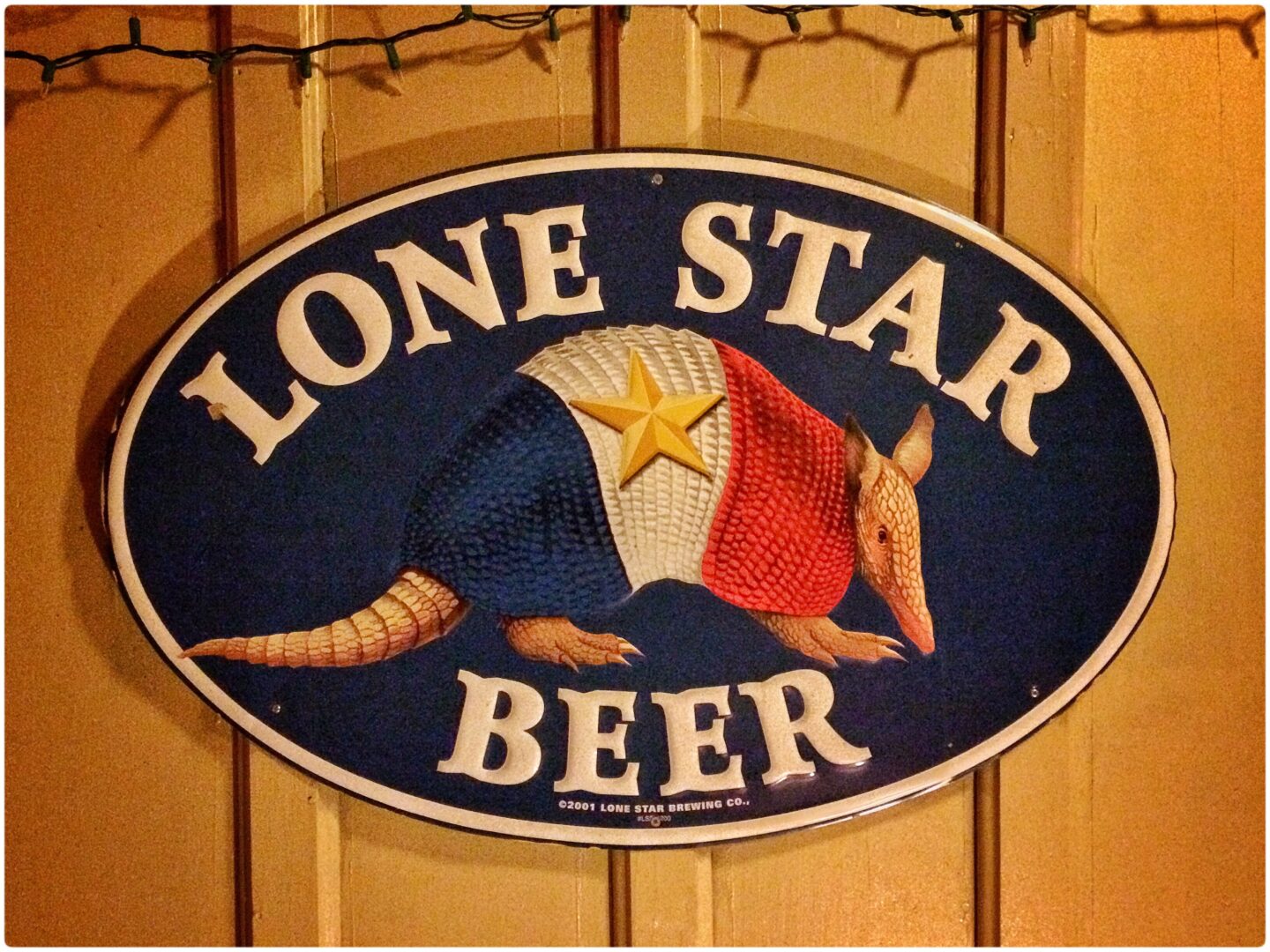 A sign that says lone star beer.