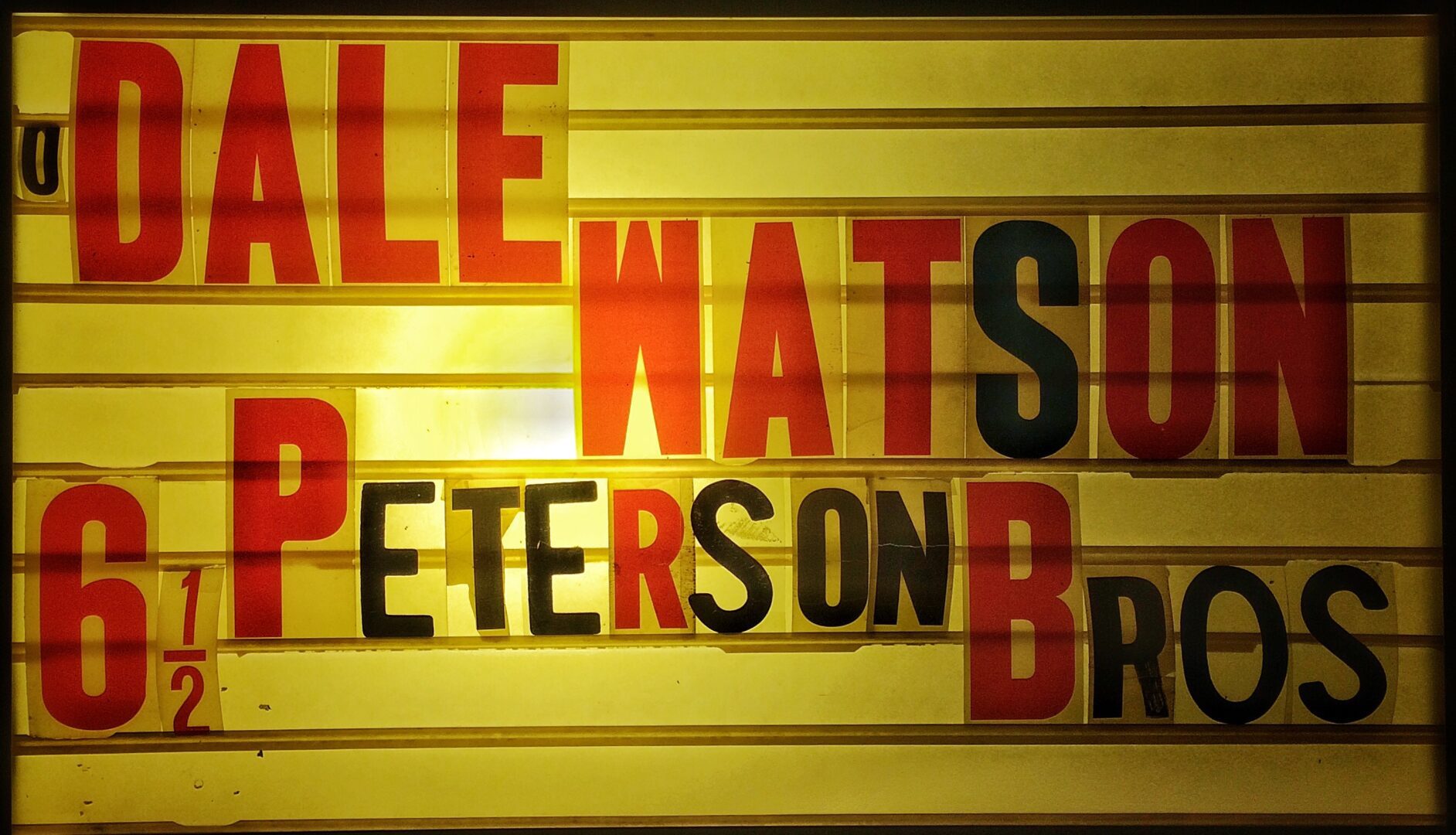 A sign that says dale watson 6 peterson bros.