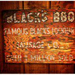 A sign that says black's bbq.