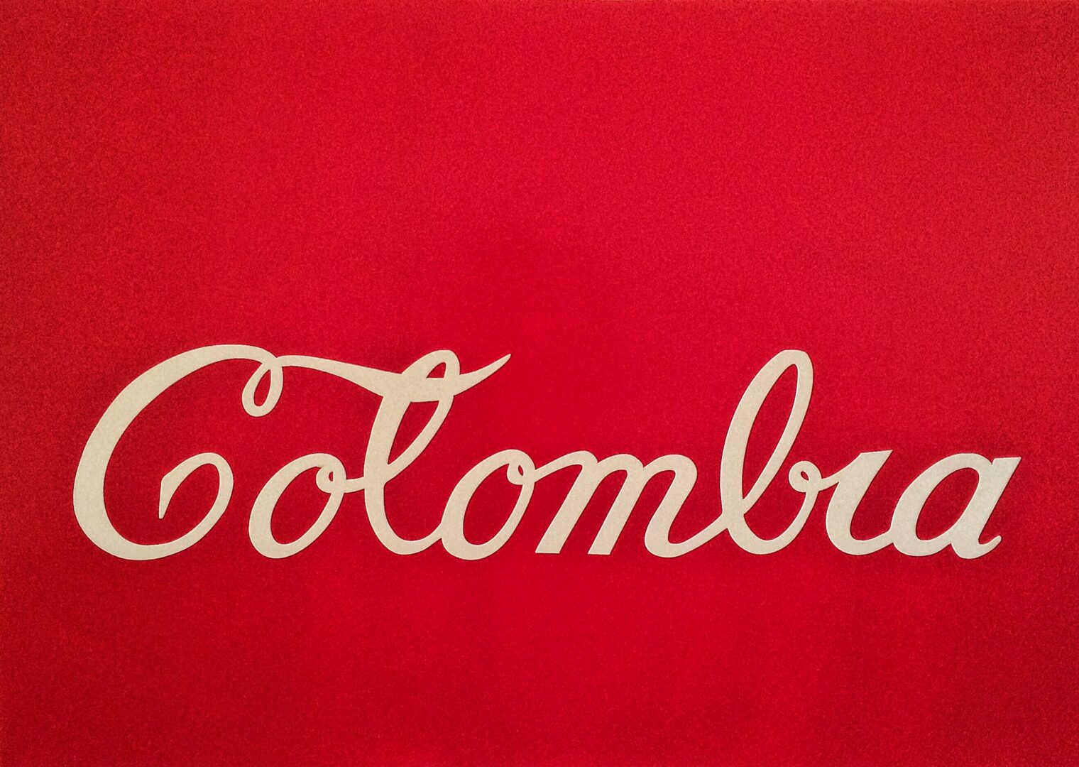 The word colombia is written on a red background.