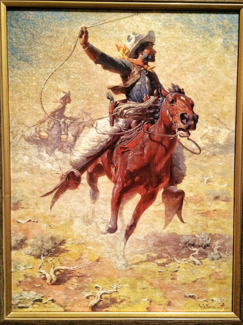 A painting of a cowboy riding a horse.