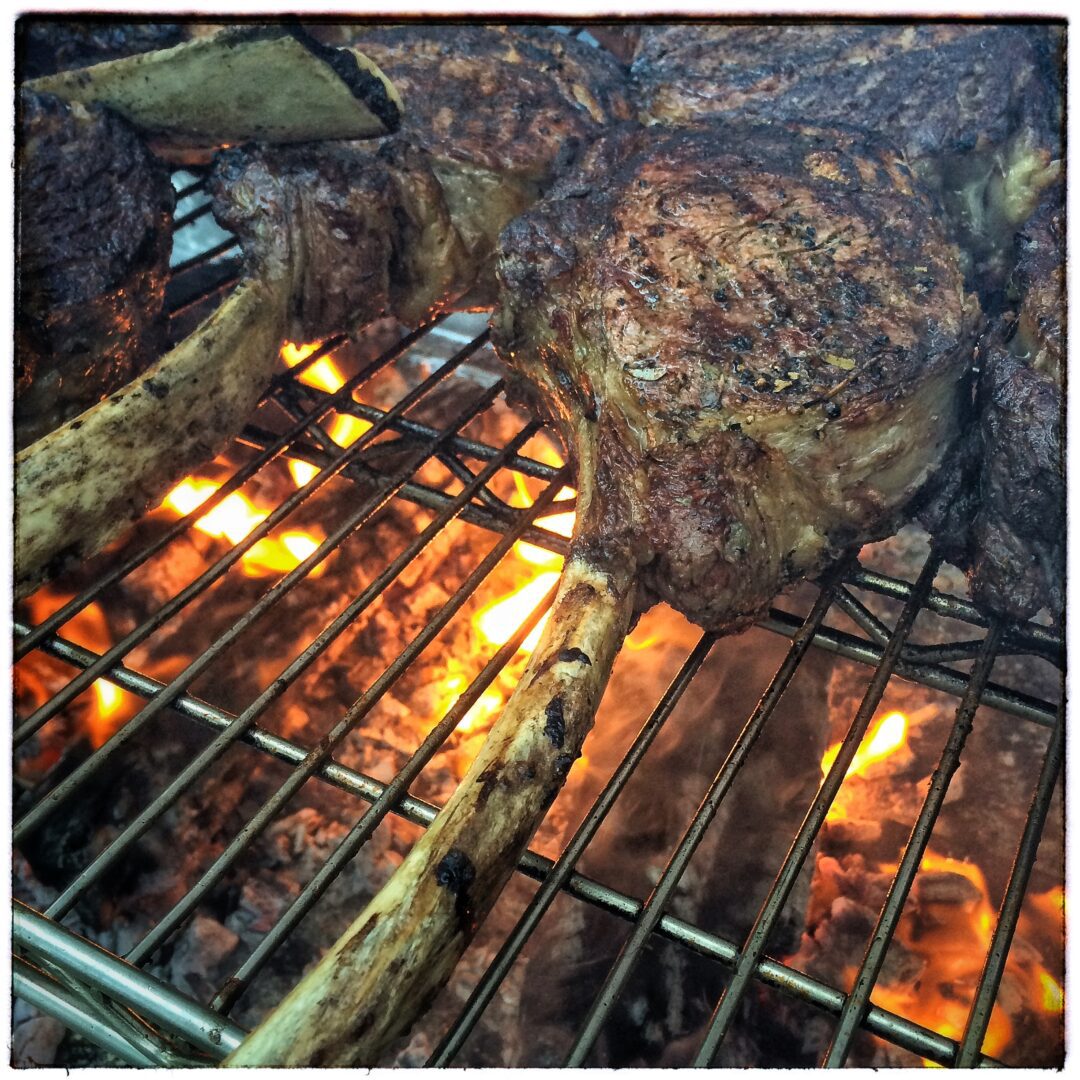 Cooking 'Tomahawk' Steaks Over a Real Mesquite Wood Fire 