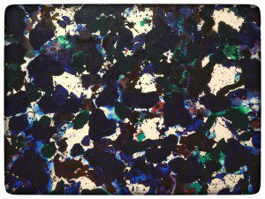 A painting with blue, green, and black splatters.