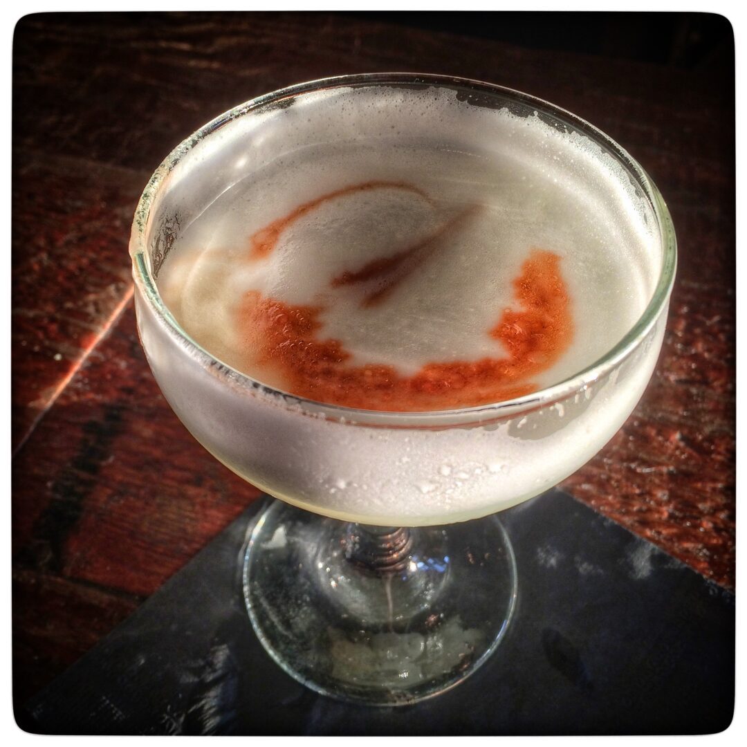A martini in a glass.