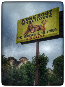 A billboard with a woman in a bikini.