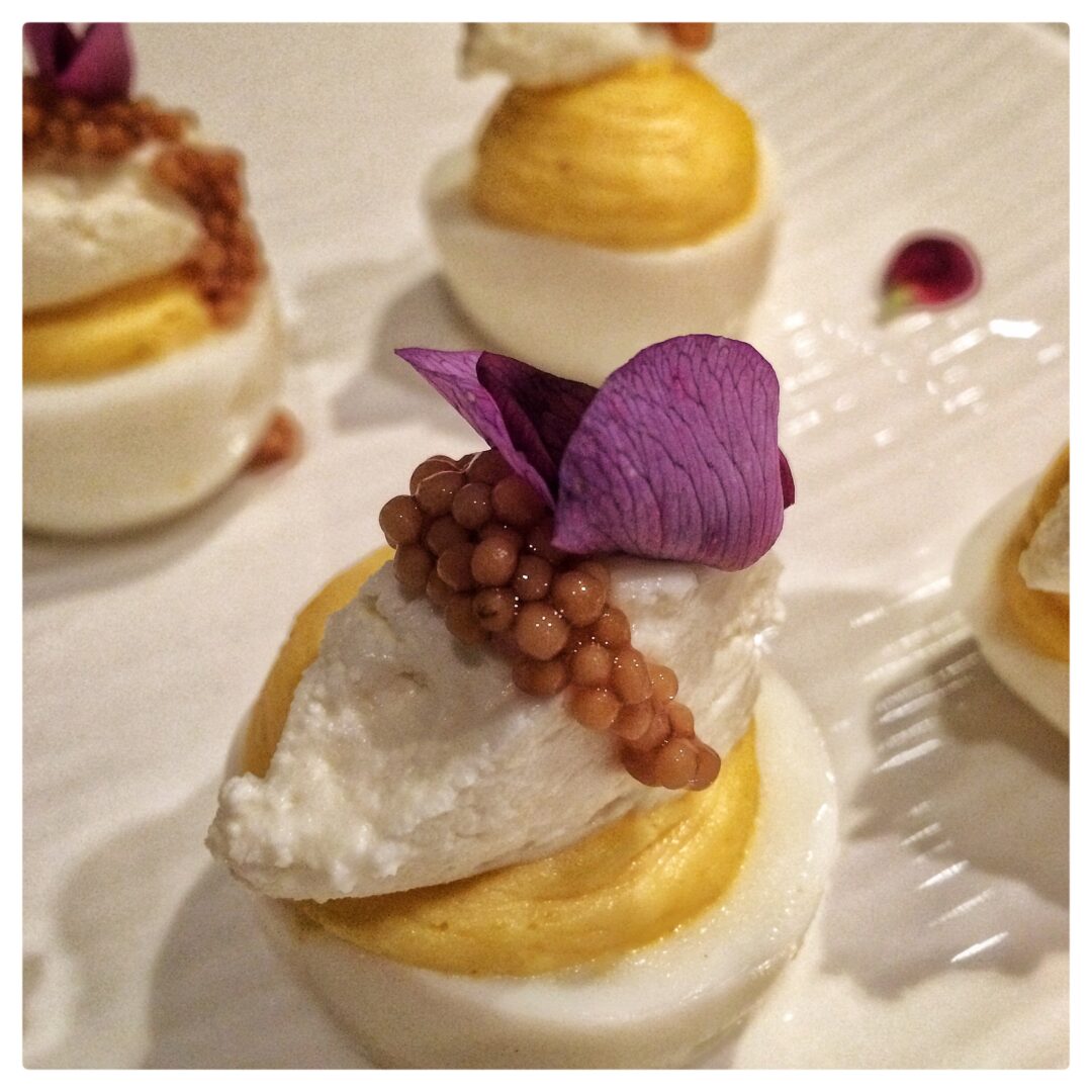 BLC Deviled Eggs with Fromage Blanc, Pickled Mustard Seeds & Fava Flowers