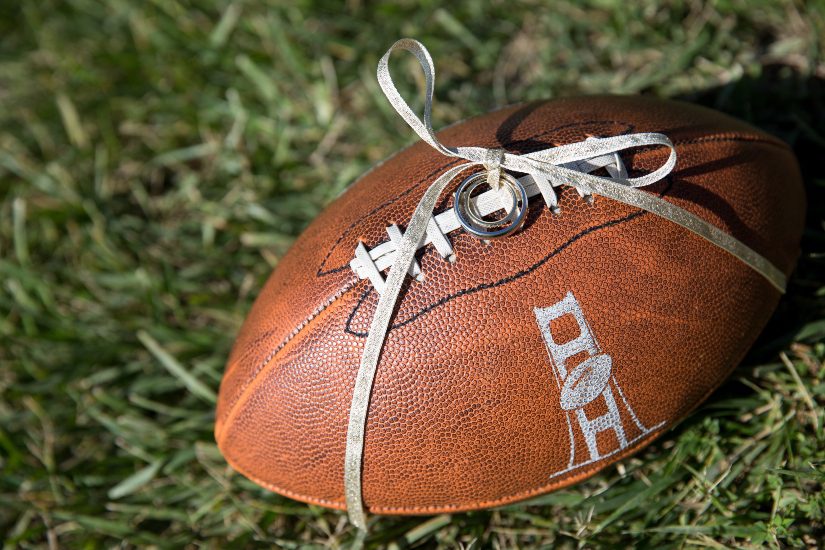 A football on the grass.