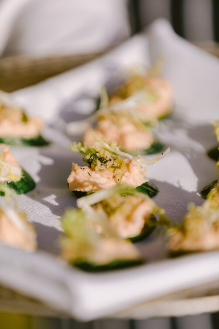 A tray of appetizers on a white plate.