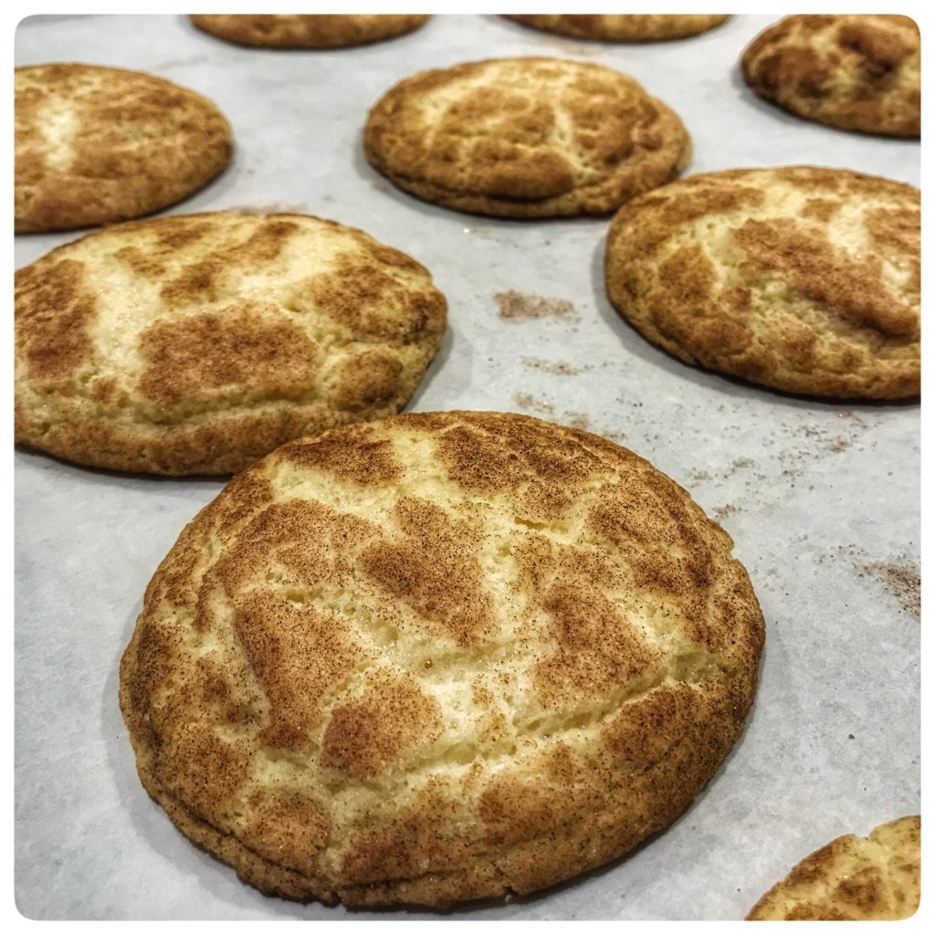 Cinnamon sugar cookies on a baking sheet.