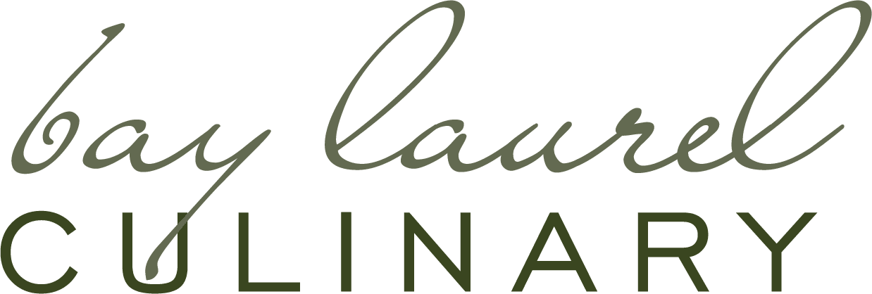 This is a logo for "bay laurel culinary" in a script typeface, with the words "bay laurel" above the word "culinary," all in a green color.