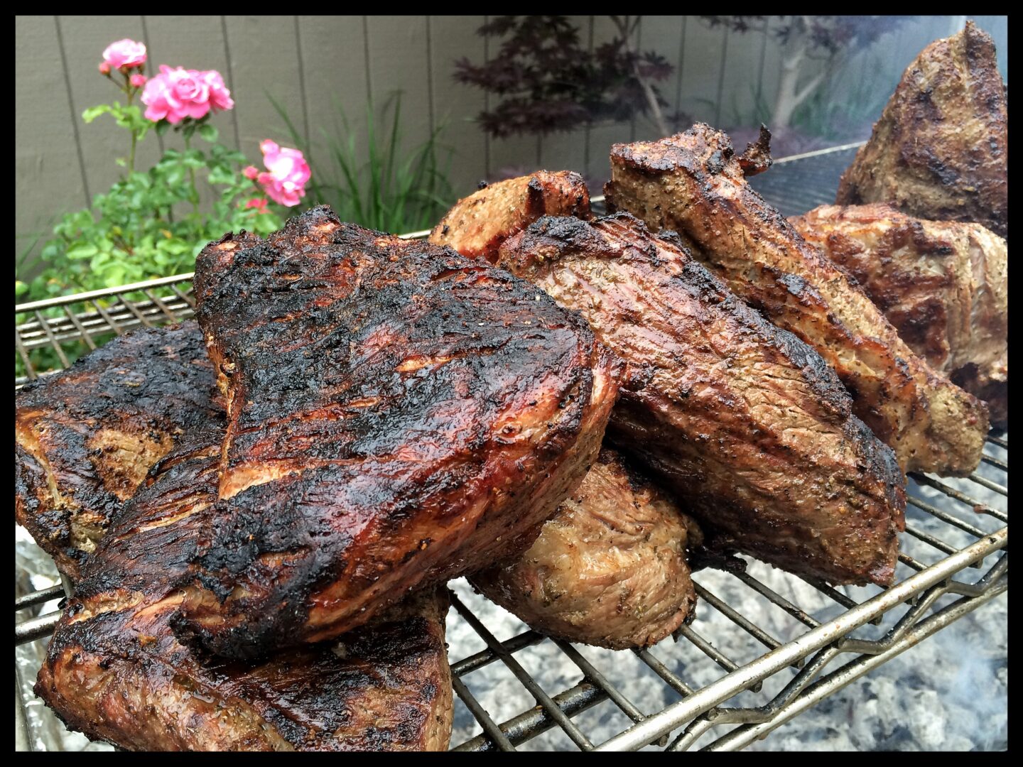 Forty Pounds of Tri Tip Rest over the Warm Mesquite Coals