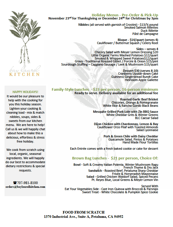 A menu for a restaurant with a green leaf on it.