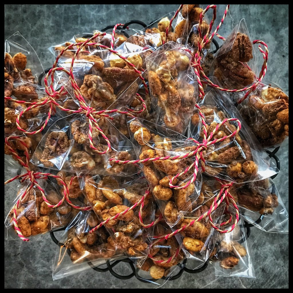 A basket filled with nuts wrapped in plastic.