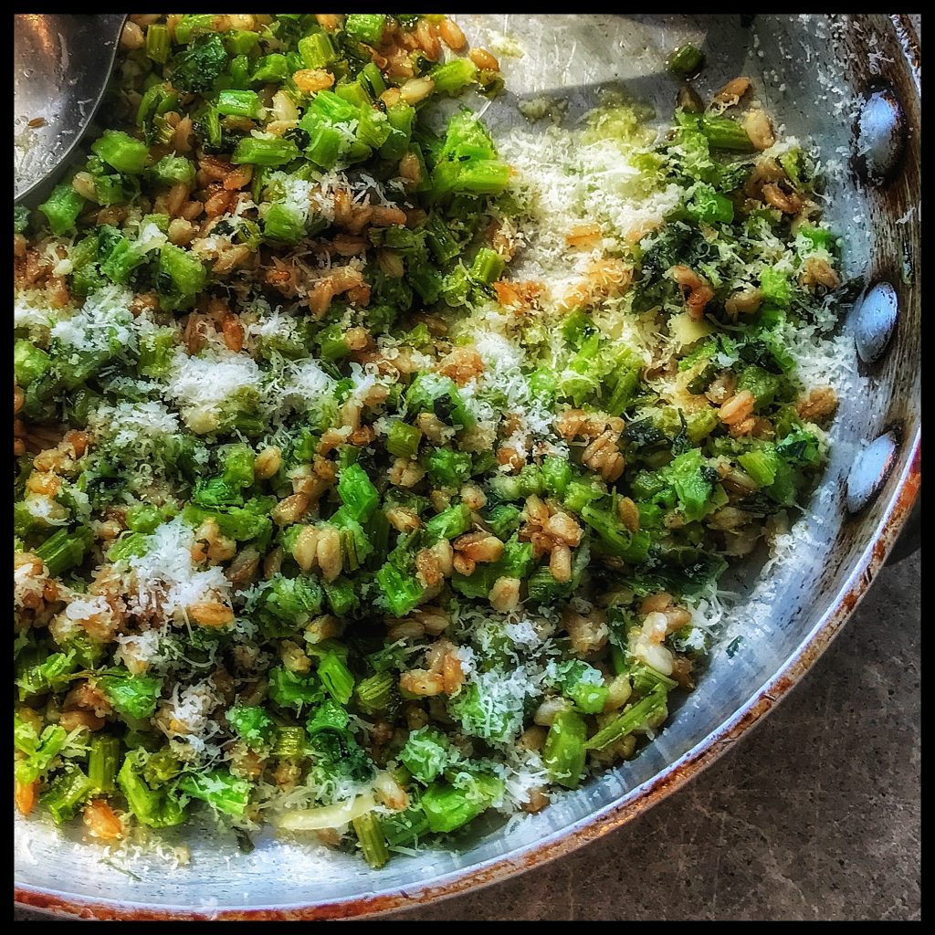 A pan filled with broccoli and parmesan.