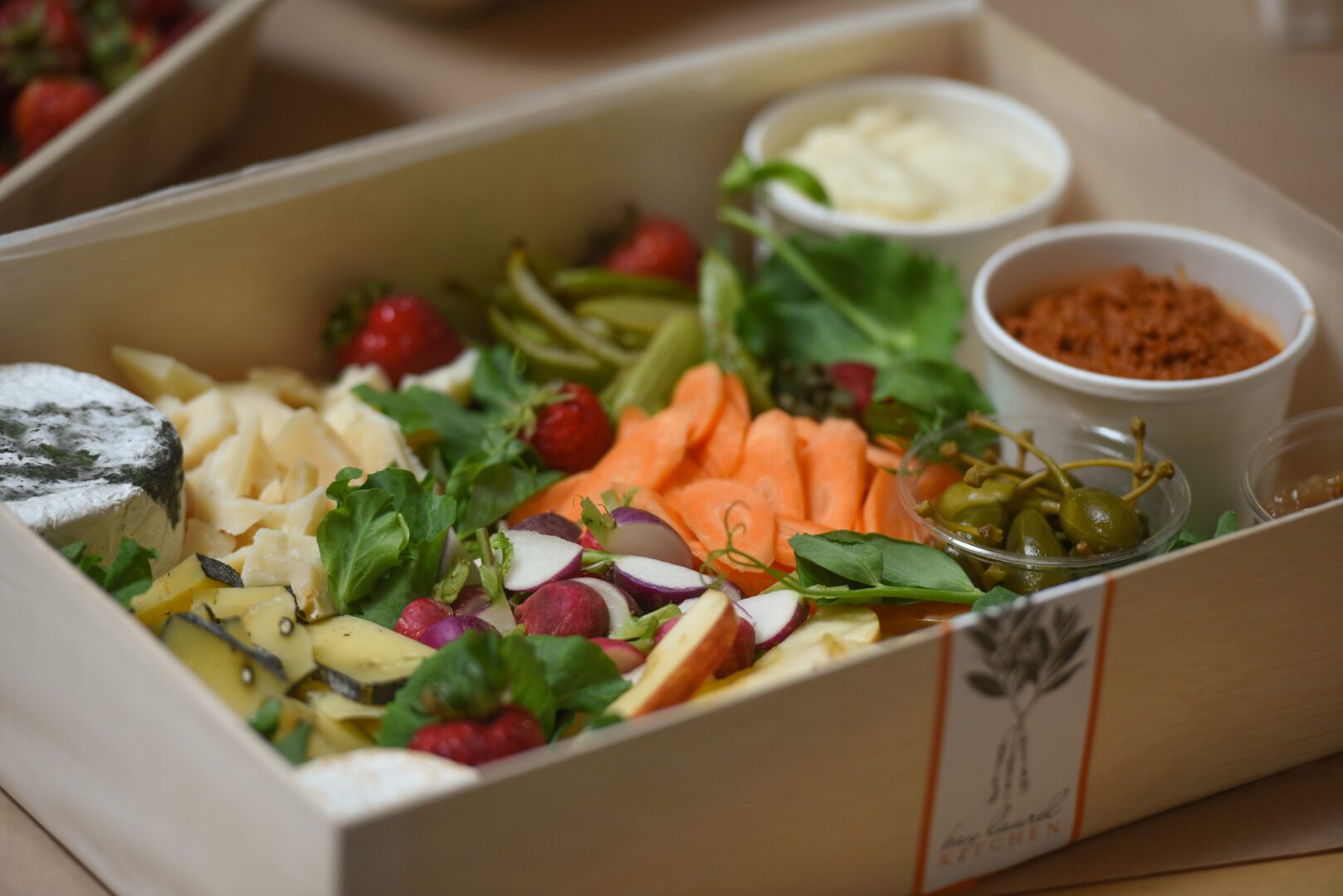 A box with a variety of vegetables in it.