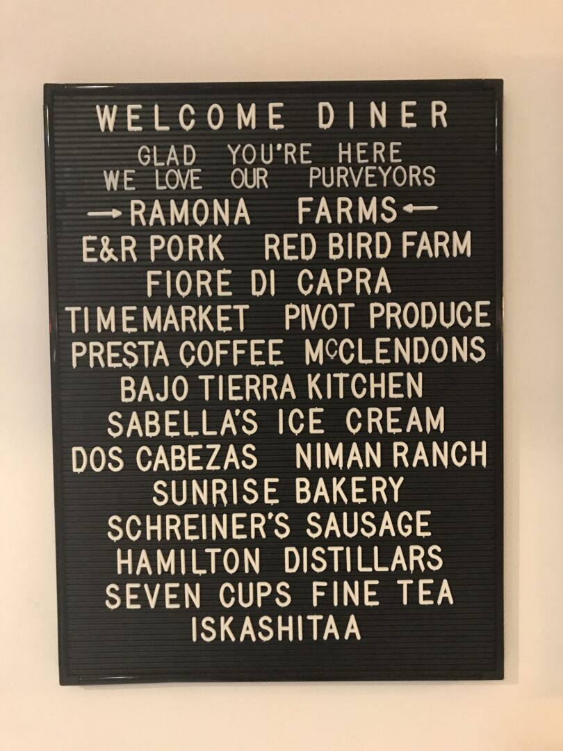 A sign that says welcome diner on a wall.