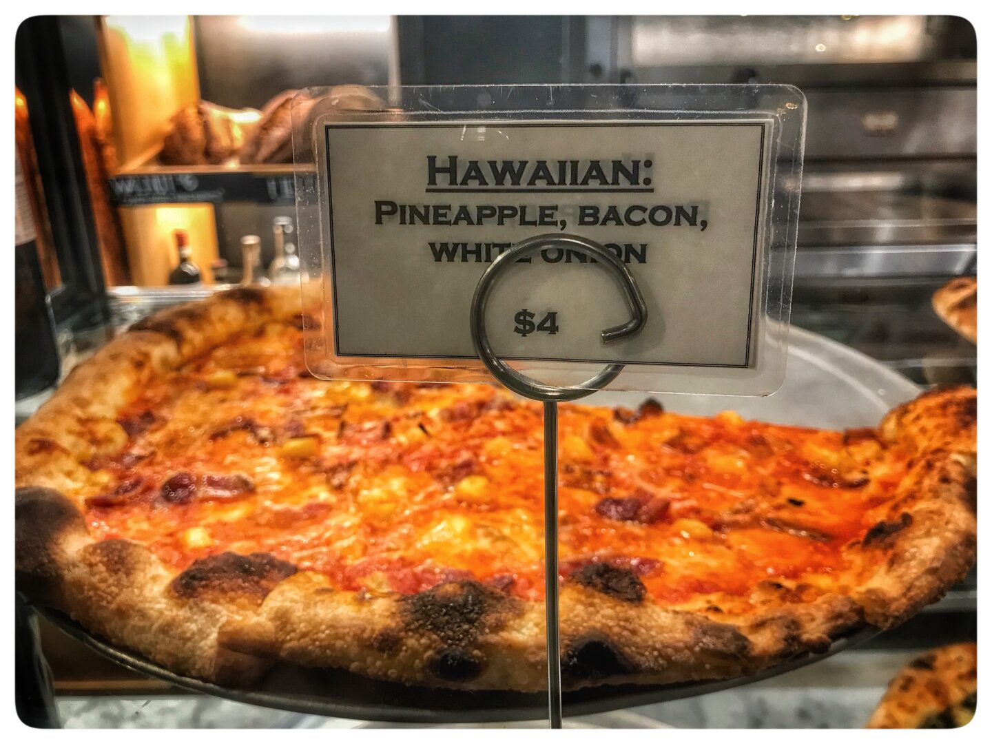 Hawaiian pineapple bacon pizza.
