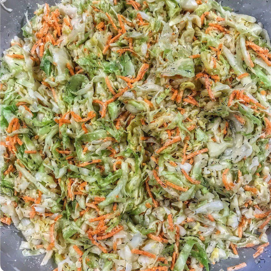 Cabbage slaw in a mixing bowl.