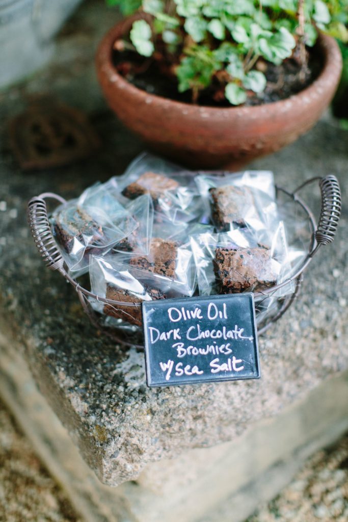 Olive oil dark chocolates for sale in a basket.