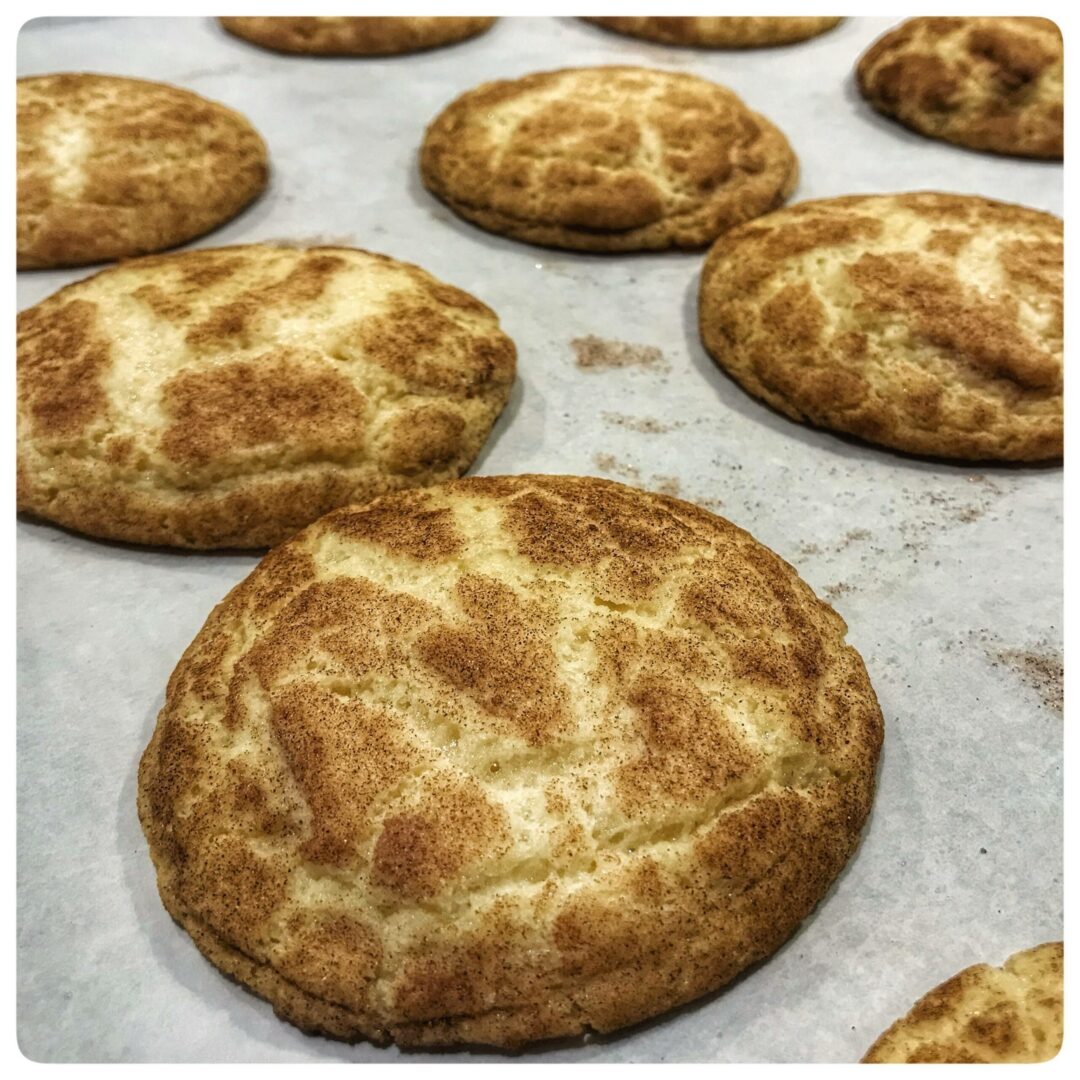 Cinnamon sugar cookies on a baking sheet.